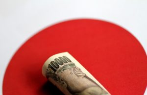 Asia FX muted, yen drops after BOJ keeps dovish course