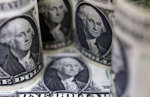 Dollar edges lower ahead of key U.S. inflation release