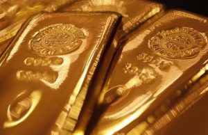 Gold prices steady after strong November gains, Powell in focus