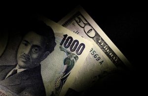Dollar slips back, yen holds ground ahead of BOJ meeting