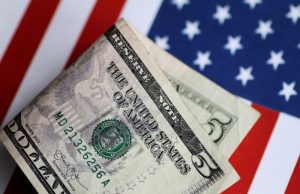 Dollar finds foothold ahead of jobs opening, services PMI data