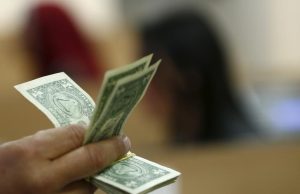 Dollar largely unchanged ahead of CPI release; 2024 gains intact