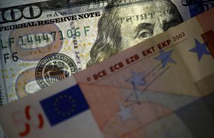 Dollar edges lower, euro gains ahead of key inflation readings