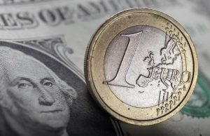 Dollar just higher ahead of payrolls; euro hands back some gains