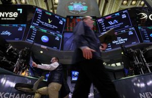 Futures tick lower, Tesla shares slump, Bitcoin rises – what’s moving markets