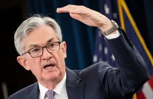 Fed Holds Rates, Signals Reduced Cuts in 2026 Amid Stagflation Risks