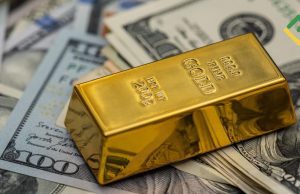 Gold slips as strong dollar weighs; Copper surges to record on Trump tariff move