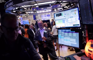 Wall Street Rises on Strong Earnings and Fed Cut Expectations