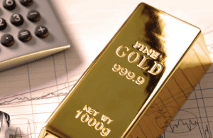 Gold climbs toward record high ahead of U.S. jobs report