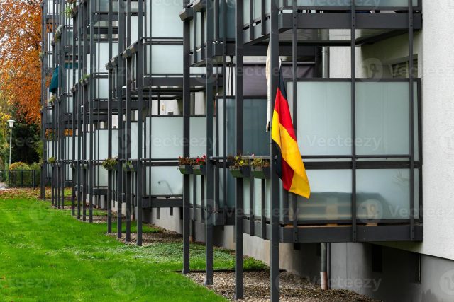 modern-apartments-featuring-german-flag-in-urban-setting-photo