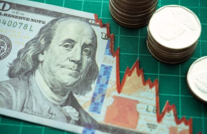 Dollar Slides as Fed Cut Speculation Intensifies