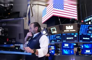 U.S. Stocks Slip After Shutdown Ends as Cisco Shines