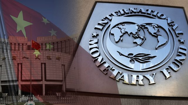People walk past the China Bank headquarters building in central Beijing