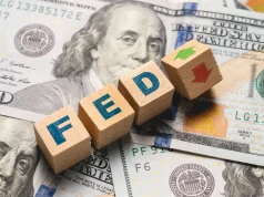 Dollar Drops as Fed Softens Hawkish Outlook and Markets Bet on More Cuts