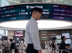 Asia Markets Slip as AI Jitters and Oracle Rout Drown Out Dovish Fed