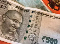 Indian Rupee Crashes Past 90/Dollar to Record Low as Aussie Jumps on Strong GDP