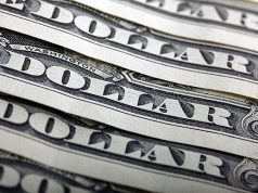 Dollar Slides for Third Week as Markets Reassess Fed Outlook