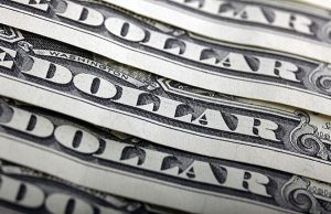 Dollar Slides for Third Week as Markets Reassess Fed Outlook