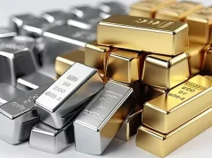 Gold Holds Steady Ahead of Fed Cut; Silver Soars Past $62/oz