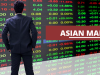 Asian Stocks Slide as Tech Weakness Returns; BOJ Rate Hike in Focus
