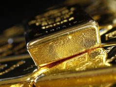 Gold Pulls Back From Record Highs as Trump Eases Iran, Fed Fears