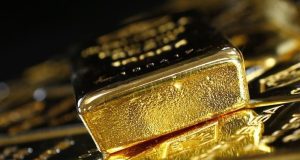 Gold Pulls Back From Record Highs as Trump Eases Iran, Fed Fears