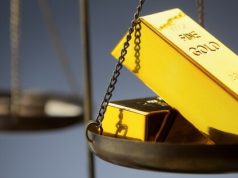 Gold Falls on Rising Hawkish Fed Bets, Yet Heads for Best Month Since 1982