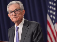 Fed Holds Rates Steady, Flags Elevated Inflation and Stabilizing Jobs