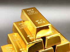 Gold Slips but Holds Above $5,000 as Silver Pulls Back