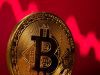 Bitcoin Dips Below $70,000 as Markets Await Key U.S. Data