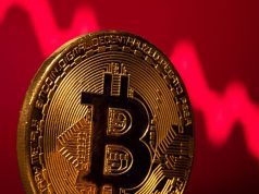 Bitcoin Dips Below $70,000 as Markets Await Key U.S. Data