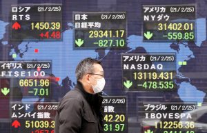 Asian Shares Surge on AI Tailwinds; India Rallies as RBA Hikes Rates