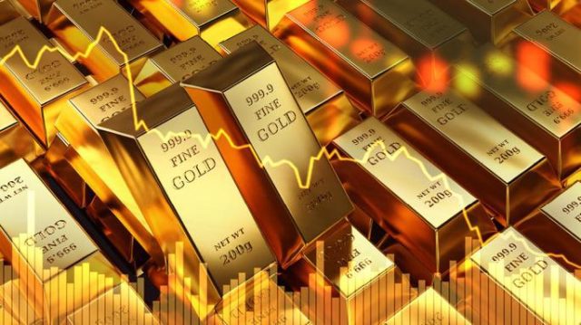 Gold-bars-with-price-chart-behind-it