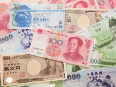 Asian Currencies Jittery as Iran Tensions Lift Dollar; Aussie Gains Ahead of RBA