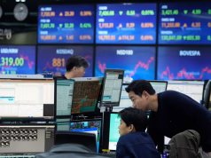 Asia Markets Mixed as Nikkei Falls After BOJ Rate Decision; KOSPI Hits Record High