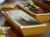 Gold Slips as Oil Prices Surge on Iran Tensions Ahead of Fed Decision