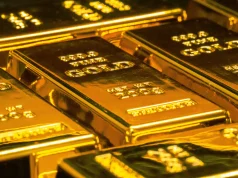 Gold Rises as Oil Falls Below $100, Cooling Inflation Concerns