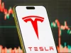 Tesla Gains as Report Points to New Low-Cost EV Development