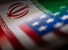 Disputed Hormuz Incident: Iran Claims Strike, U.S. Denies Any Damage
