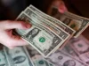 Dollar Slips as Markets Await Warsh’s First Fed Decision