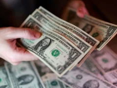 Dollar Slips as Markets Await Warsh’s First Fed Decision