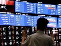 Asia Stocks Mixed as Fed Rate Hike Bets Rise and Iran Tensions Escalate