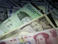 Asian Currencies Mixed as Dollar Holds Two-Month High, Yen Stays Weak